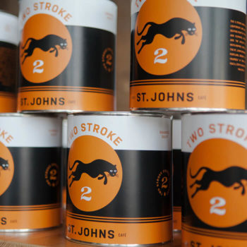 Paint can coffee bean packaging featuring the 2Stroke logo.
