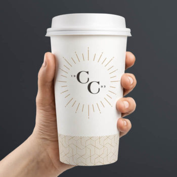 A disposable coffee cup featuring the Coffee Culture emblem.
